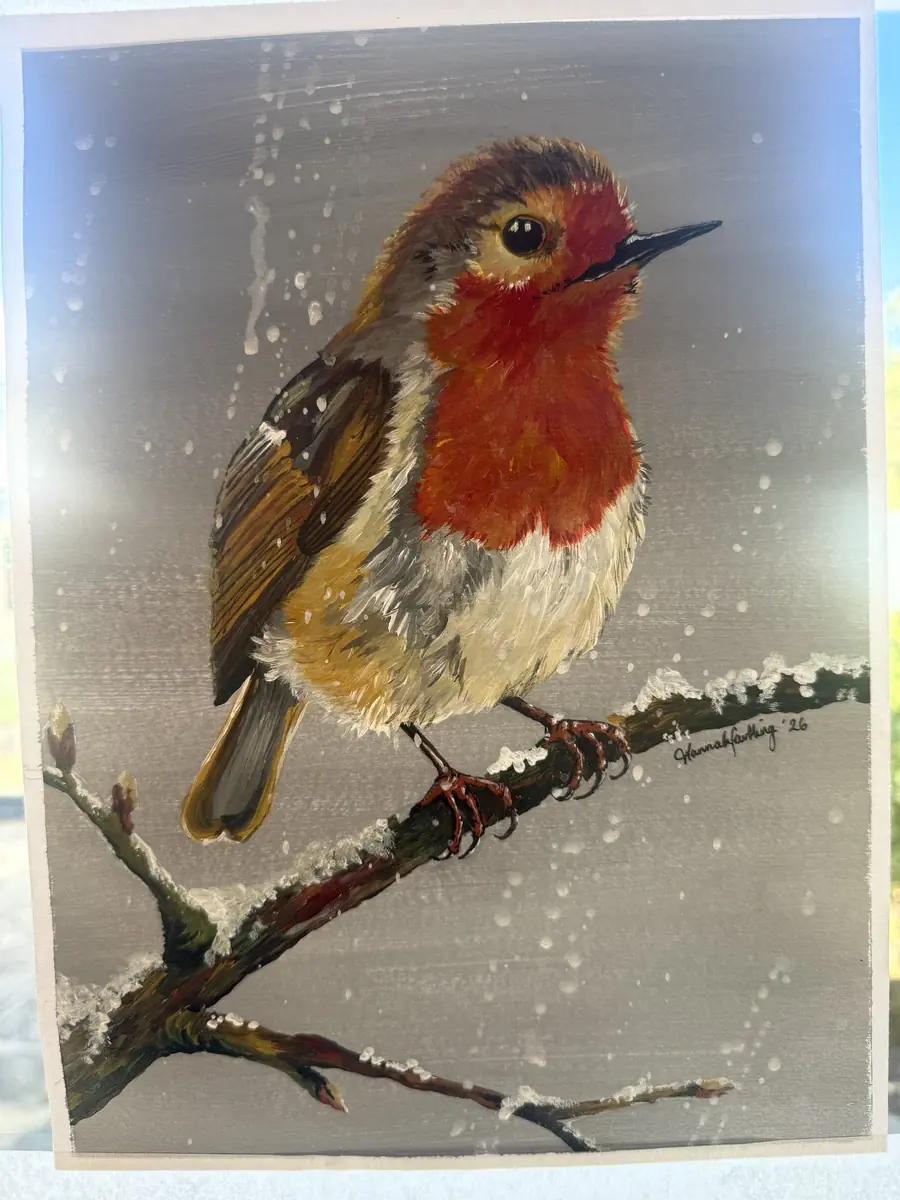Example painting for the class: a robin on a snowy branch, painted in acrylic.